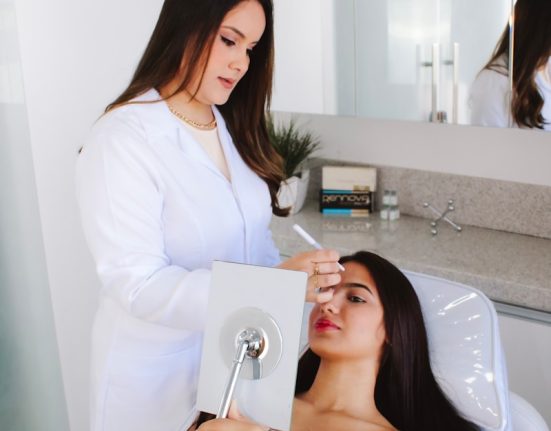 A woman getting her hair done in a salon